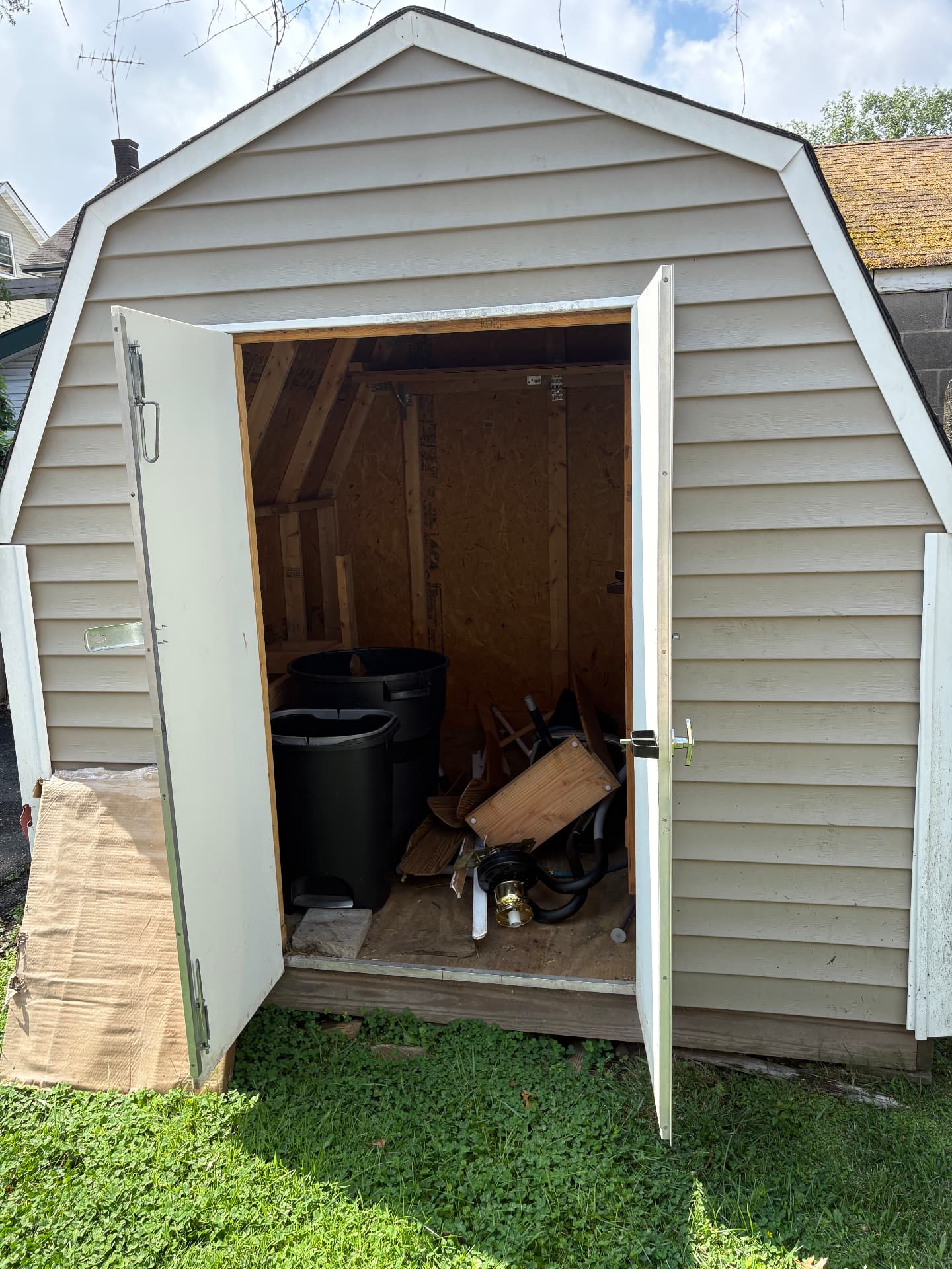 Backyard shed cleared out and taken down for removal in New Jersey